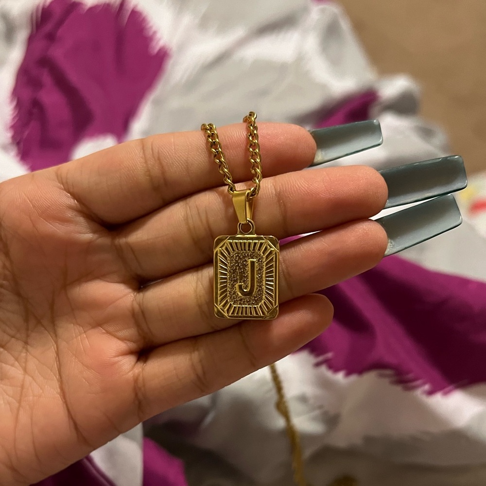 Not worn Letter “J” gold necklace!